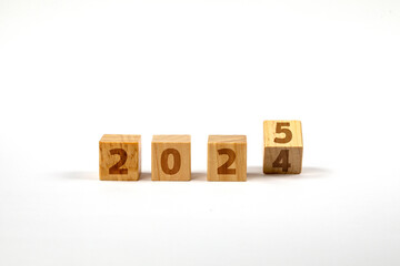 Wooden Blocks With 2024 2025 Number On Table	