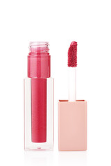 Open tube of pink lip gloss and wand brush