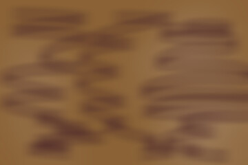 An abstract image featuring a blurry blend of warm autumn tones, including shades of brown, orange, and yellow, creating a soft, seasonal atmosphere blurry autumn color palette background. 