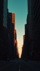 A stunning cityscape at dusk, showcasing tall buildings and a vibrant sunset casting golden hues down a quiet street.