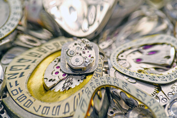 Old mechanical watches with gears and cogs. Watch or clock mechanisms