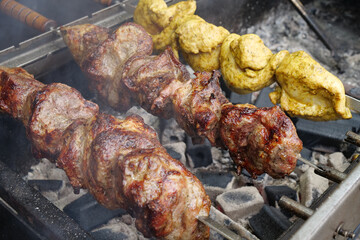 Shish kebabs broils in barbecue. Delicious hot kebabs. Meat are cooked