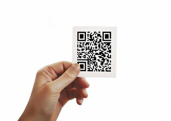 A hand gripping a large QR code, ready to scan, symbolizing the integration of technology in daily life.