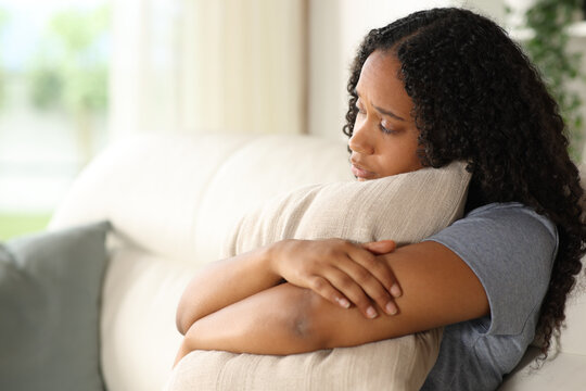 Girl hugging pillow 2025