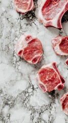 Fresh raw meat chops arranged on a marble surface, perfect for culinary and food photography.