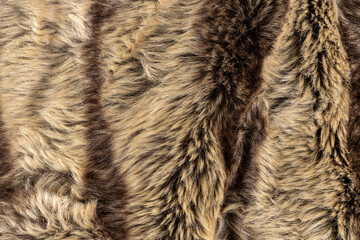 Faux Fur Fabric Texture with luxurious rich brown and beige color palette and stripes