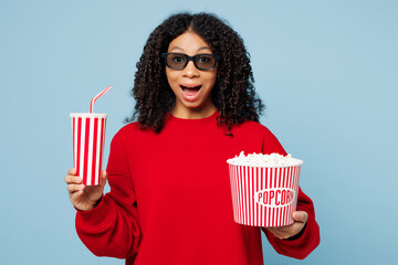 Little kid teen girl of African American ethnicity wear red sweatshirt 3d glasses watch movie film...