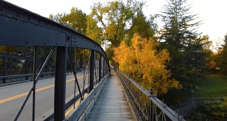 bridge over the river, autumn in the city, woodstock, vermont, usa