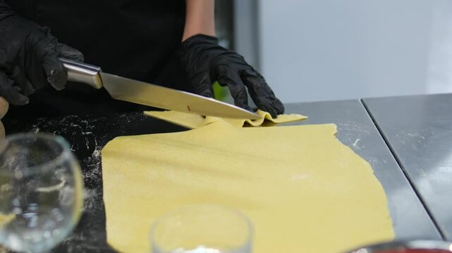 Cooky cuts noodle on desk cut the dough cook noodles