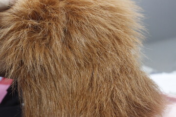 photo of synthetic material with brown orangutan fur for industrial purposes