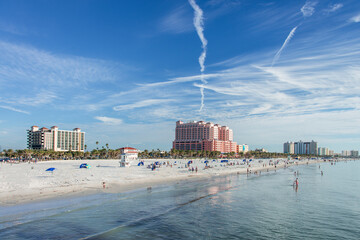 Sunny afternoon on Clearwater beach, known for its calm, clear waters, traditional area of sea sports, leisure, fishing and families presence. Clearwater, Florida, USA, 2019