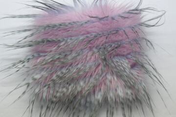 photo of a pink and black hairy synthetic material for industrial purposes