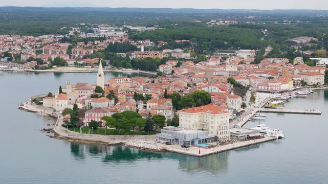 Aerial drone video of the coastal town named Porec in Istria, Croatia.