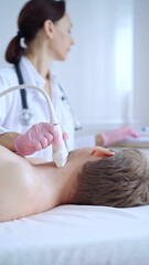 Doctor woman with pink medical gloves performing neck ultrasound exam on male patient. Thyroid gland examination. Medicine concept