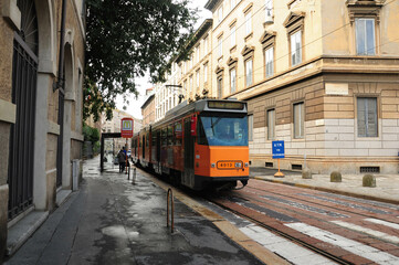 Obraz premium Milan, Lombardy, Italy. October 25, 2010: Historic tram on a quiet street in Milan, Italy.