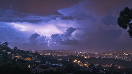 Fototapeta premium Lightning Strike Over a Nighttime Cityscape