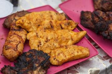 Different types of meat on the outdoor grill