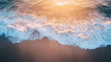 A breathtaking view of the ocean at sunset, with golden hues reflecting off the water and soft waves breaking on the shore, capturing nature's beauty.
