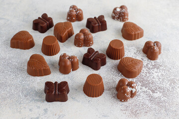 Handmade chocolate with pistachios, dark and milk chocolate pieces.