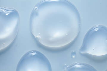 Liquid gel serum cosmetic smudge blue gray background