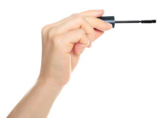 Woman hand holds cosmetic mascara brush, isolated on transparent background, cosmetics and visage concept