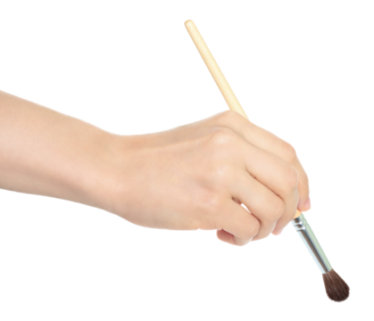 Woman hand holds paint brush, isolated on transparent background, painting and design concept