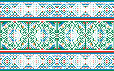 Hmong ethnic patterns designed in green, blue, and red tones that are unique to this ethnic group are used in clothing design.