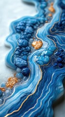 epoxy resin-inspired artwork in blue and gold with fluid textures and glossy bubbles