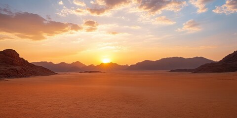 Obraz premium A stunning desert sunset, showcasing vibrant colors and distant mountains under a beautifully lit sky.