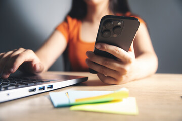 young girl works in the office