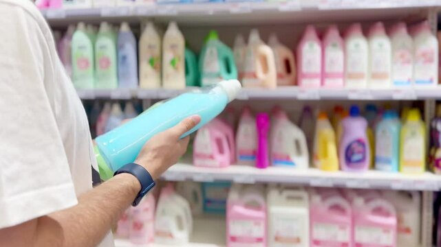 shopping in supermarket.(washing powder,detergent,shampoo, soap)