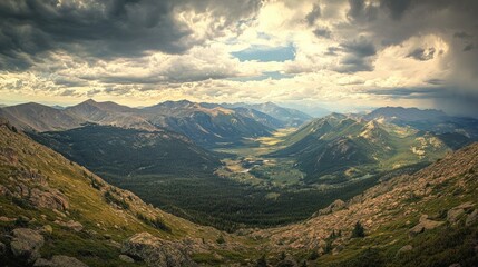 Naklejka premium Mountainous Landscape Under a Cloudy Sky