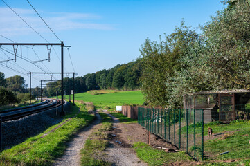 Allotment gardens along the railway tracks in Pécrot, Wallon Region, Belgium