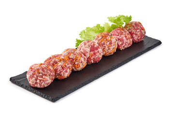 Raw pork cutlets, isolated on white background.