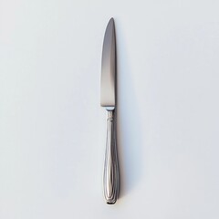 A sleek stainless steel knife with a patterned handle, designed for cutting food.