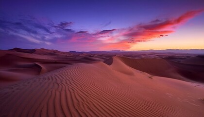 Naklejka premium Desert sunset with pink clouds