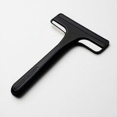 Obraz premium A sleek black squeegee designed for cleaning surfaces efficiently.
