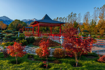 Fototapeta premium A public park in the Kazakh city of Almaty with a fragment of a traditional Japanese garden on an autumn morning