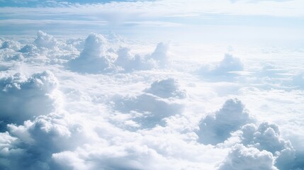 Obraz premium Aerial View of Fluffy White Clouds and Blue Sky