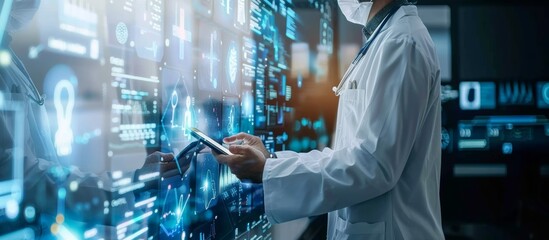 A doctor is using digital technology to control medical data and information on the screen