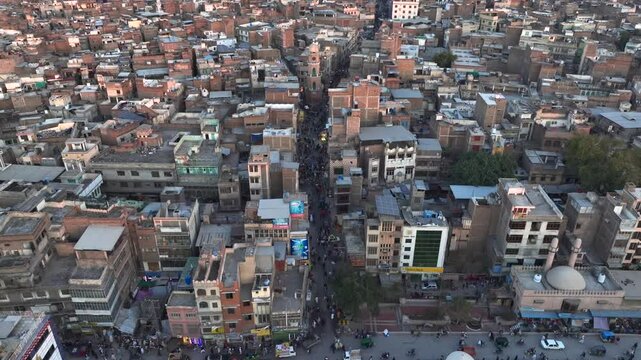 Cunningham Clock Tower on Streets of Peshawar, Pakistan. Downtown City Center Drone view Aerial Evening twilight Shot