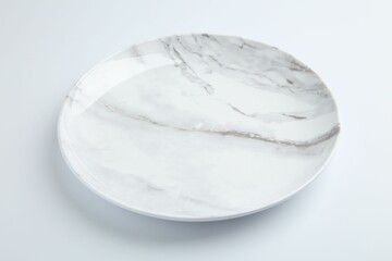 One empty ceramic plate isolated on white