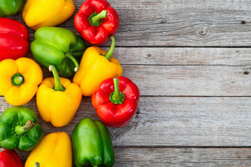 Fresh sweet bell pepper ( paprika ) photography red , green and yellow . Colorful vegetable . Top view