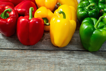 Fresh sweet bell pepper ( paprika ) photography red , green and yellow . Colorful vegetable . Top view