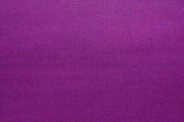 Bright violet crepe Paper texture background purple color.