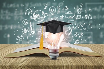 Graduation cap with lamp lightbulb in the classroom
