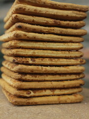 close up pile of dry biscuits cookies