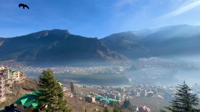 colorful prayer flags on metal bridge at Manali, Himachal Pradesh, IndiaBeas river manali close up with selective focus and blur.