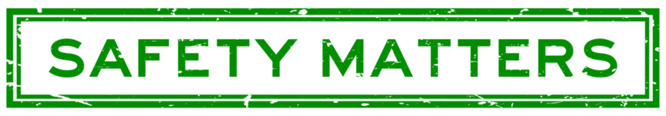 Grunge green safety matters word square rubber stamp in white background