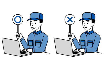 ○×マークを上げるノートパソコンで仕事をしているつなぎ作業服の男性